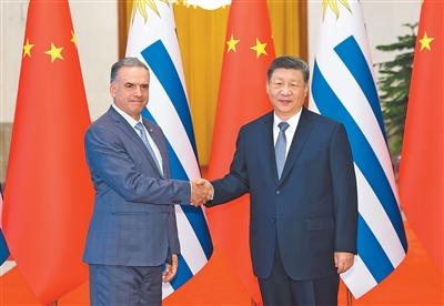 【人民日报】习近平同乌拉圭总统奥尔西举行会谈
